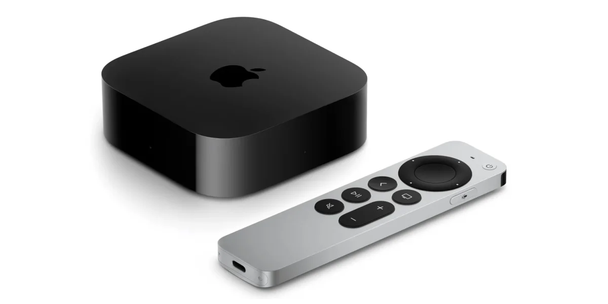 A black box with a silver remote control
