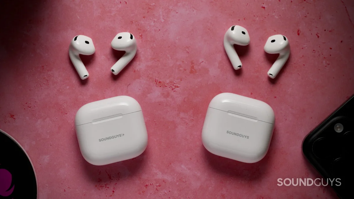 AirPods 4 with ANC and AirPods 5 earbuds beside their charging cases