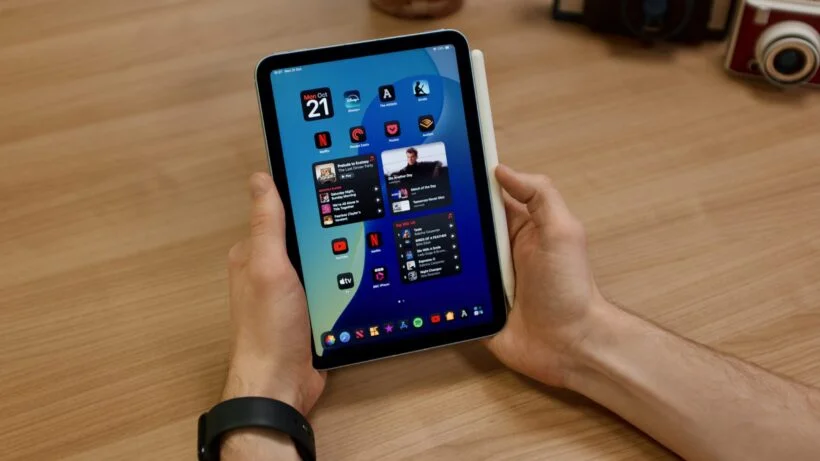 iPad Mini 7 being held in hand