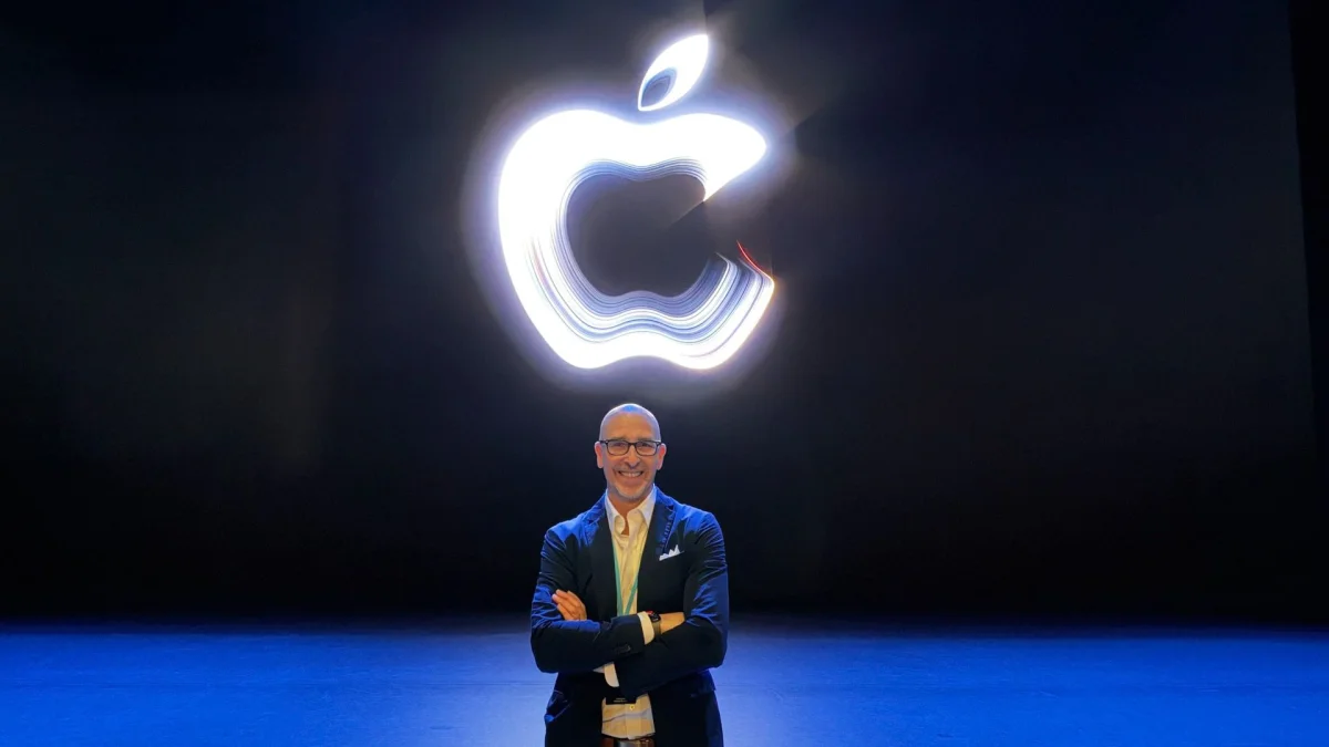 A man under an Apple logo at Apple's 'Pro and Tell' event